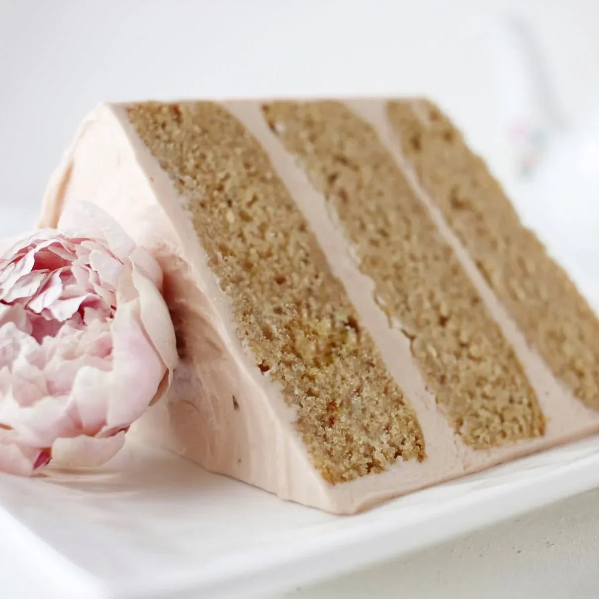 slice of cake with freeze-dried edible flower